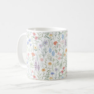 Kvallaktig feminin äng med vilda blommor kaffemugg