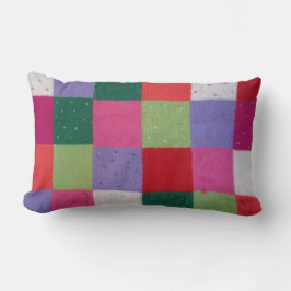 Kvartborrtorn av färgade stickade lappverk lumbarkudde