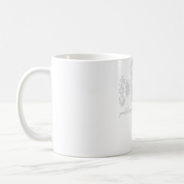 Kvinna dig bland Wildblommornas inspiratio Kaffemugg (Vänster)