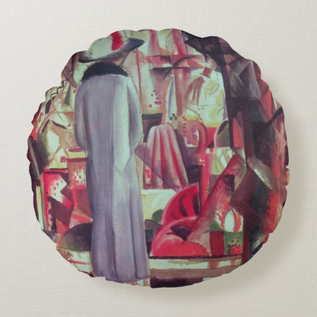 Kvinna framme av ett stort upplyst fönster rund kudde (Framsidan)