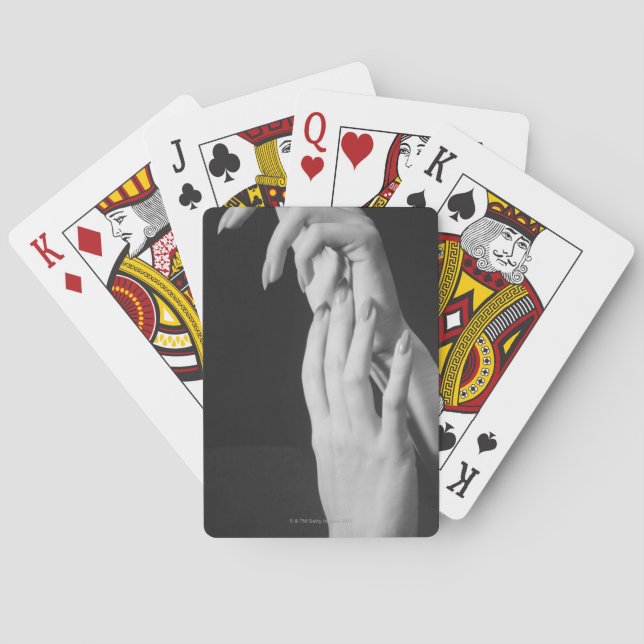 Kvinna händer casinokort (Baksidan)
