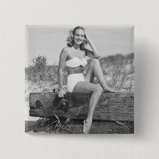 Kvinna i bikini knapp