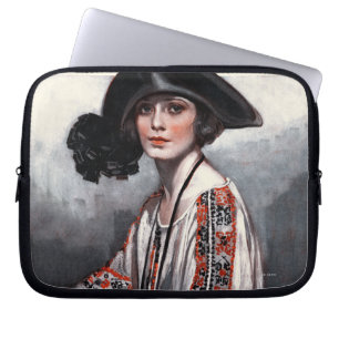 Kvinna i broderad blus laptop sleeve
