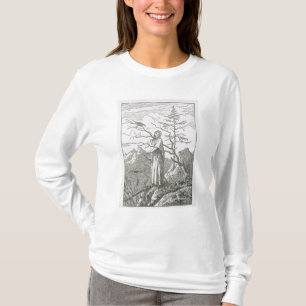 Kvinna med ett korpsvart, på kanten av ett tee shirt