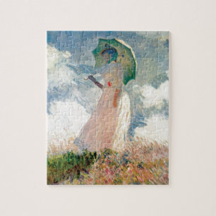 Kvinna med ett slags solskyddpromenaden Monet Pussel