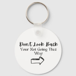 Kvinna som inspirerar "titta inte tillbaka"-positi nyckelring