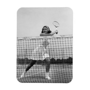 Kvinna som leker tennis magnet