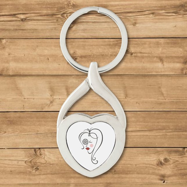 Kvinnlig fotograf twisted heart silverfärgad nyckelring (Skapare uppladdad)