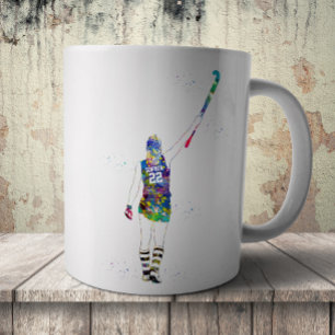 Kvinnlig landhockeyspelare kaffemugg