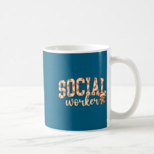 Kvinnlig socialarbetare pepparkaksgubbe skola kaffemugg
