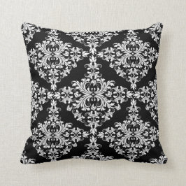 Kvinnlig vit på svart damast kudde
