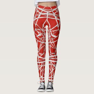 Kvinnliga ben med rött och vitt vågar leggings