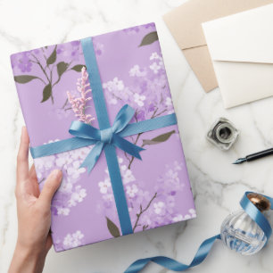 Kvinnligt lila syrenblomsterblommönster presentpapper