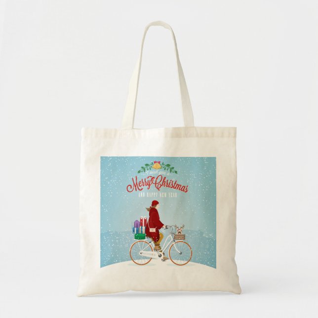 Kvinnor i en cykel i vinterjul tygkasse (Framsidan)