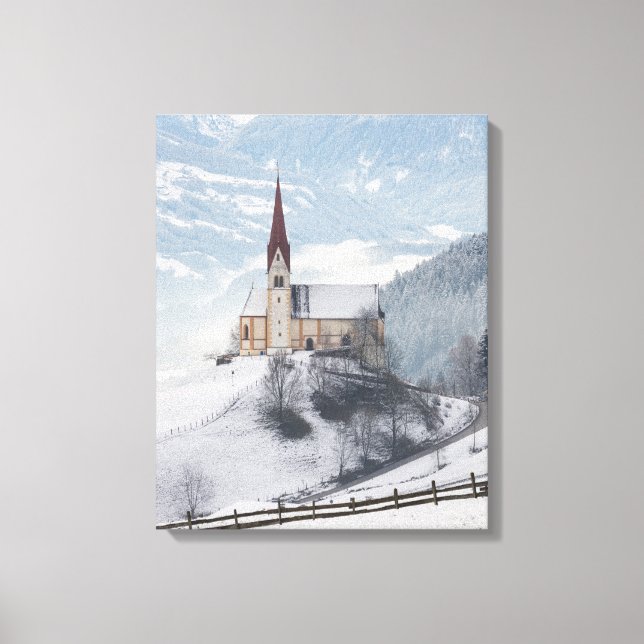 Kyrka i ett alpint vinterlandskap canvastryck (Framsida)