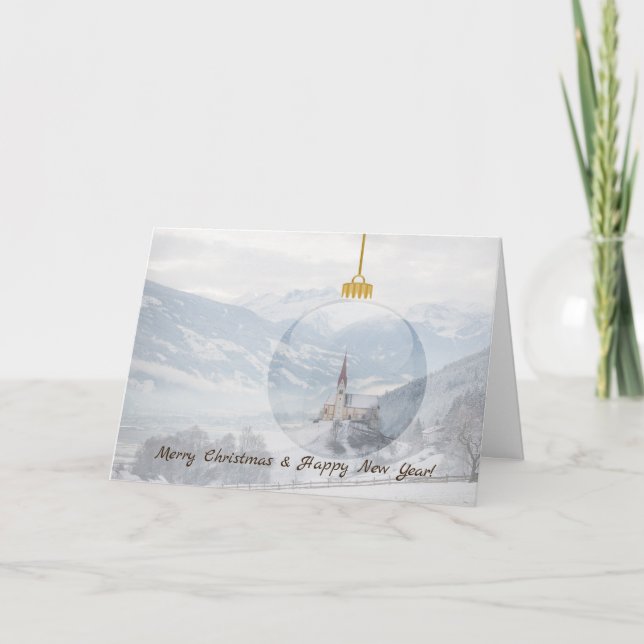 Kyrka på vintern i ett boll-julkort av glas helgkort (Framsida)