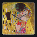Kyss av Gustav Klimt, Vintage Art nouveau Fyrkantig Klocka<br><div class="desc">Den ultimata målningen av kärlek, en vacker design för att fira Alla hjärtans dag med! Kiss (detalj) (1907-1908) av Gustav Klimt är en vintage av Viktorian Era Symbolism bra art kärlek och romantik som har ett romantiskt par i olika nyanser av guld, mönster och symboler och som delar en kyss...</div>