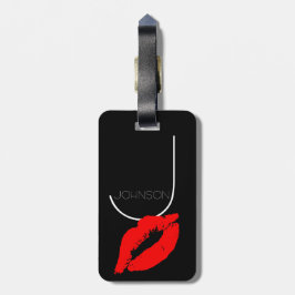Kyssläppar svärtar den röda läppstiftJohnson Bagagebricka
