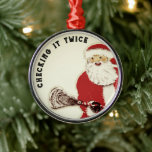 Lacrosse Santa Collecable Julgransprydnad Metall<br><div class="desc">Den ursprungliga,  första någonsin "Checking it Twice"-slappa designen från 2009.</div>