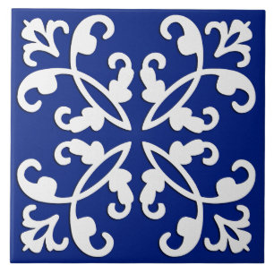 Lacy cutwork - white over lapis blue kakelplatta