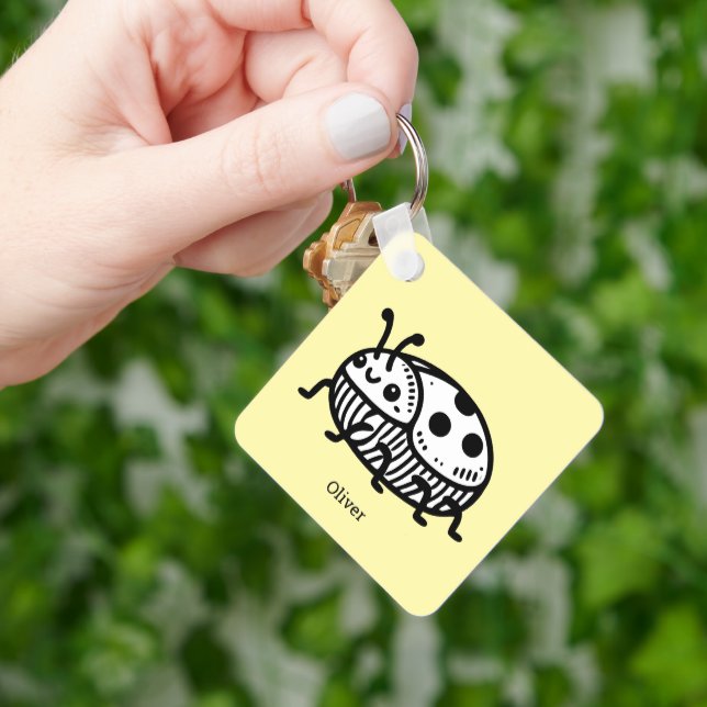 Laddning av illustration av handritad beetle nyckelring (Hand)