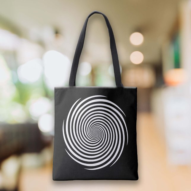 Lagra magasin i detta tygkasse (Carry a little magic with you wherever you go with this sleek black tote bag. )