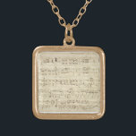 Lakan Music on Parchment Handskriftlig i Bläck Guldpläterat Halsband<br><div class="desc">Gamla vintage lakan-musiken i svart bläck på ett antikt beige-parchment med anteckningar. Minnen från en tid sedan,  när musiken skrevs för hand i bläck. Teckningar och skript på ge är en personlig beröring.</div>