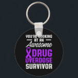 Läkemedelsöverdosering Medvetandeförklaring Surviv Nyckelring<br><div class="desc">Läkemedelsöverdosering Medvetandeförklaring Survivor 55</div>