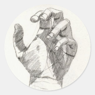 Lämnat handklistermärken runt klistermärke