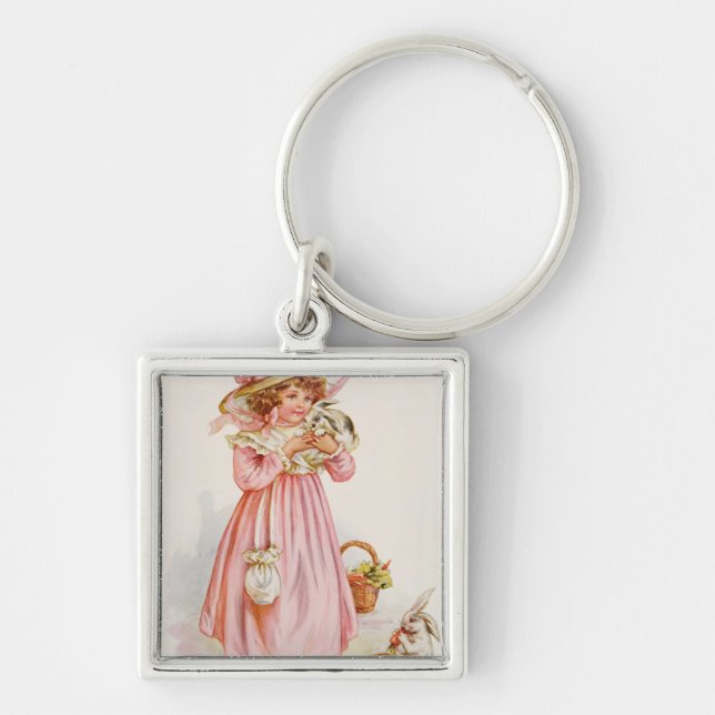 Lämnat i laddning, 1920 fyrkantig silverfärgad nyckelring (Framsidan)