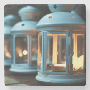 Lampor, lanternor och ljus stenunderlägg