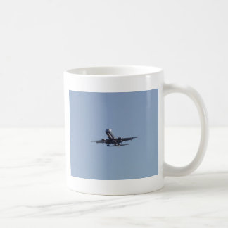 Landar i solskenet kaffemugg