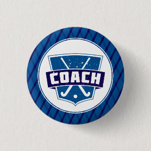 Landhockeylagledaren klämmer fast emblem knapp