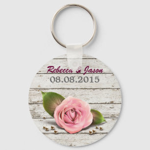 landsbyggsbröllop av viskös ved rosa ros fransk nyckelring