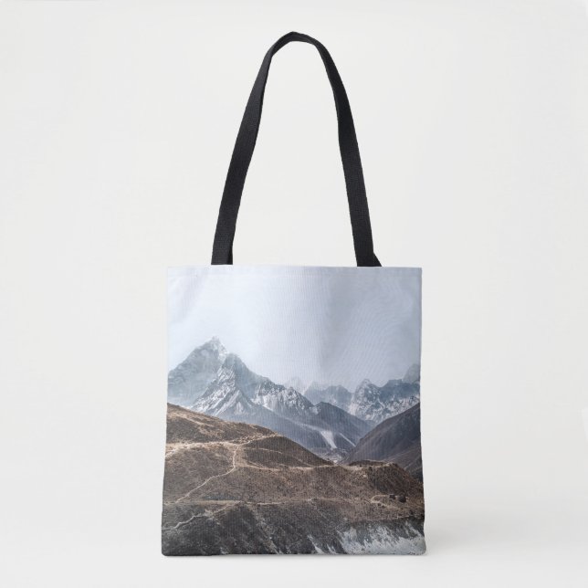 LANDSCAPE-FOTO AV MOUNTAINER UNDER VITA KLOUDER TYGKASSE (Framsida)
