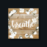 Lantbruksinspiration - Breathe Canvastryck<br><div class="desc">Lantbruksinspiration II av Jennifer Paxton Parker. Har "Breathe" i ord i kursiv stil bredvid utandning av bomull och bakgrunden till träplank.</div>