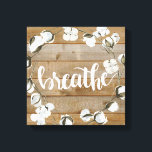 Lantbruksinspiration - Breathe Canvastryck<br><div class="desc">Lantbruksinspiration II av Jennifer Paxton Parker. Har "Breathe" i ord i kursiv stil bredvid utandning av bomull och bakgrunden till träplank.</div>