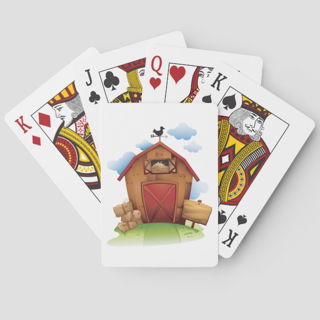 Lantlig gårdsbyggnad med väderflöjel casinokort (Baksidan)
