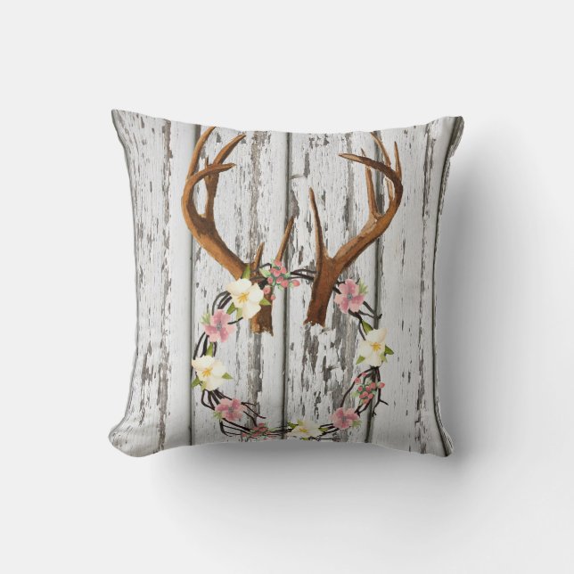 Lantlig kabinkran av blommor på horn på kudde (Framsida)