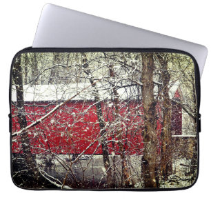 Laptop sleeve med snötäckt bron