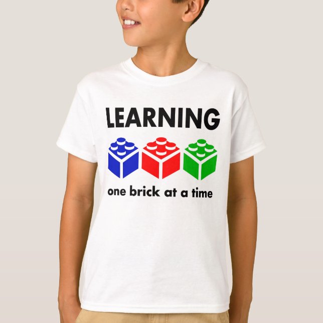 Lära… en tegelsten i sänder t-shirt (Framsida)