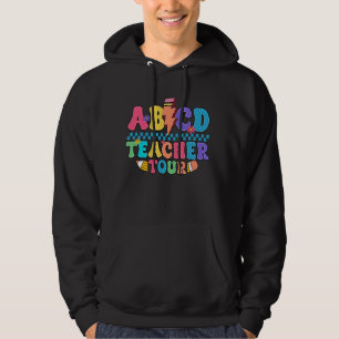 Lärare från ABCD-skolan på första skoldagen för at Hoodie