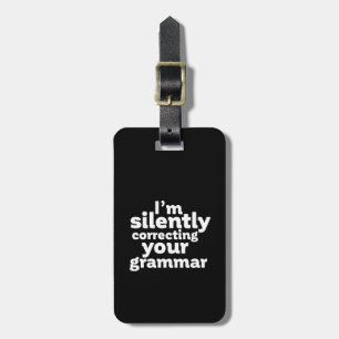 Lärare i engelska som tyst korrigerar Grammar Bagagebricka