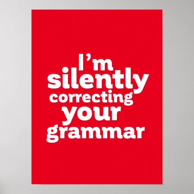 Lärare i engelska som tyst korrigerar Grammar Poster (Framsidan)