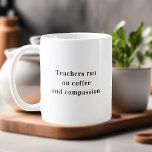 Lärare Springa på kaffeoffert Kaffemugg<br><div class="desc">**Vi presenterar vår "Lärare Springa på kaffe och kompassion" Mugg: Lärarutbildning** Högtidlighåller lärarnas engagemang och hjärta med vår "Lärare Springa på kaffe och kompassion" Mugg. Detta omsorgsfullt designade mugg håller inte bara er favoritbricka utan fungerar också som en hyllning till de lärare som häller sin passion för att forma unga...</div>