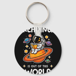 Läsning är en rymdsk astronaut rymdbok nyckelring