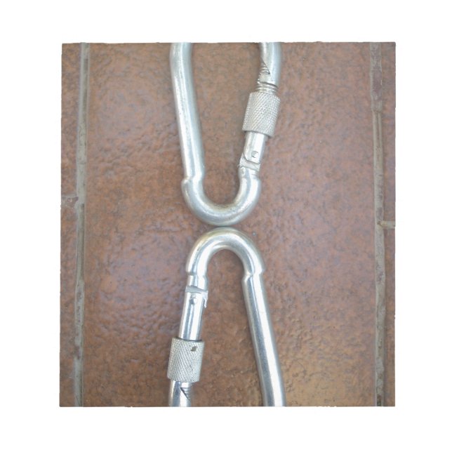 Låst i: Konstruktion för tåligt lås av stålbehålla Anteckningsblock (Framsida)