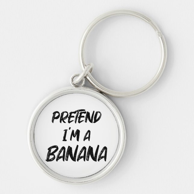Låt som om jag är en banan  rund silverfärgad nyckelring (Framsidan)