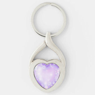 lätt lila snöflake och glittrande hjärta twisted heart silverfärgad nyckelring