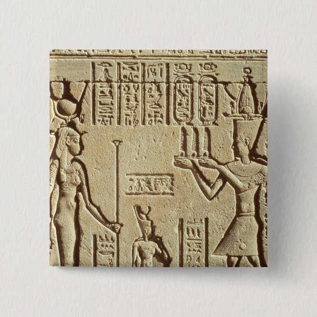 Lättnad som visar en pharaoh knapp (Framsida)